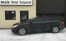 2013 Hyundai Sonata with professional window tint in North Bay